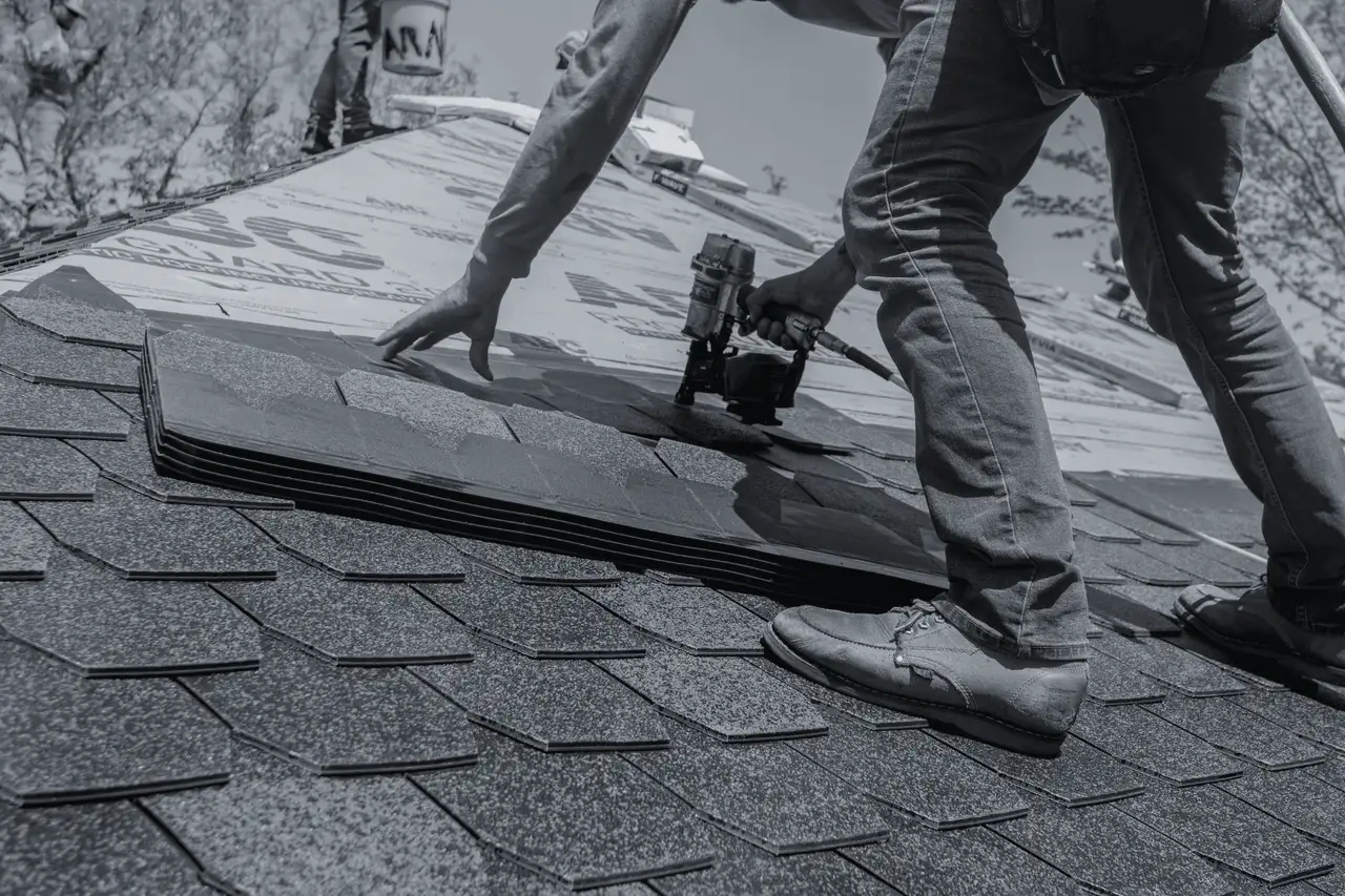 Nailing shingles on a residential roof
